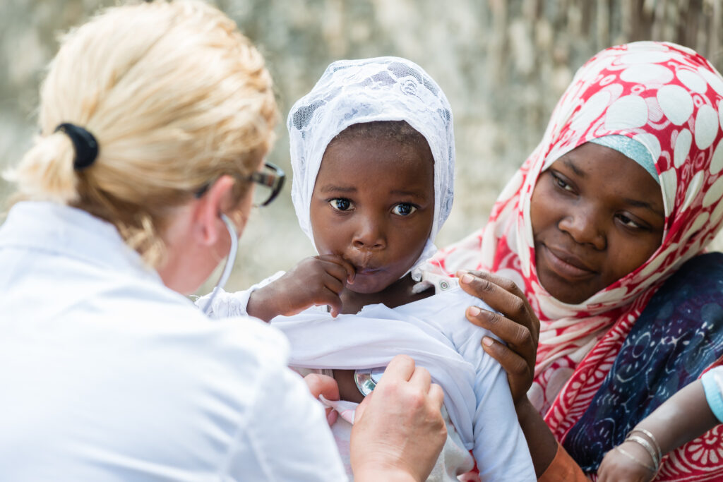 stethoscope exam of african little girl